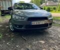 Серый Мицубиси Лансер, объемом двигателя 2 л и пробегом 255 тыс. км за 5500 $, фото 1 на Automoto.ua