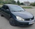 Серый Мицубиси Лансер, объемом двигателя 1.6 л и пробегом 141 тыс. км за 3350 $, фото 1 на Automoto.ua