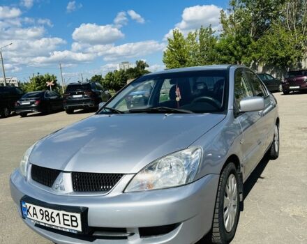 Сірий Міцубісі Lancer, об'ємом двигуна 1.6 л та пробігом 269 тис. км за 4700 $, фото 5 на Automoto.ua