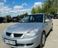 Сірий Міцубісі Lancer, об'ємом двигуна 1.6 л та пробігом 269 тис. км за 4700 $, фото 5 на Automoto.ua