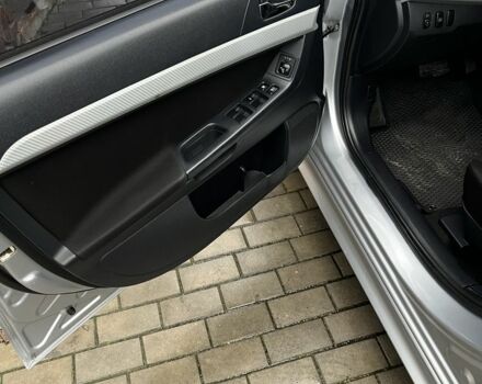 Серый Мицубиси Лансер, объемом двигателя 2 л и пробегом 227 тыс. км за 6600 $, фото 10 на Automoto.ua