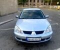 Сірий Міцубісі Lancer, об'ємом двигуна 1.6 л та пробігом 193 тис. км за 3999 $, фото 1 на Automoto.ua