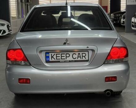 Серый Мицубиси Лансер, объемом двигателя 1.58 л и пробегом 271 тыс. км за 4200 $, фото 17 на Automoto.ua