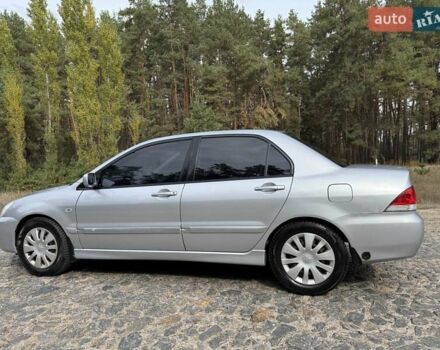 Серый Мицубиси Лансер, объемом двигателя 1.6 л и пробегом 200 тыс. км за 4400 $, фото 12 на Automoto.ua