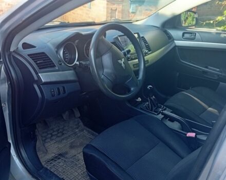 Серый Мицубиси Лансер, объемом двигателя 1.5 л и пробегом 215 тыс. км за 4999 $, фото 6 на Automoto.ua