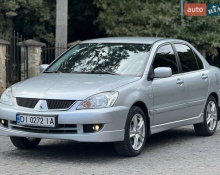 Серый Мицубиси Лансер, объемом двигателя 1.58 л и пробегом 241 тыс. км за 3750 $, фото 6 на Automoto.ua