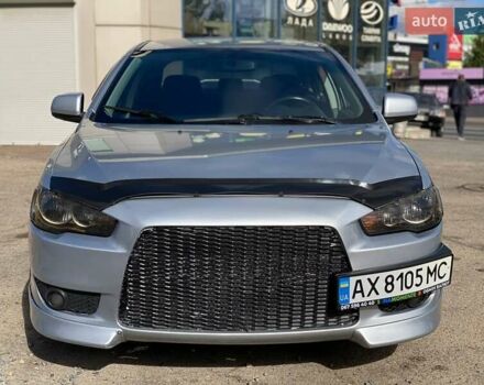 Серый Мицубиси Лансер, объемом двигателя 2 л и пробегом 150 тыс. км за 6100 $, фото 5 на Automoto.ua