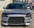 Серый Мицубиси Лансер, объемом двигателя 2 л и пробегом 150 тыс. км за 6100 $, фото 5 на Automoto.ua