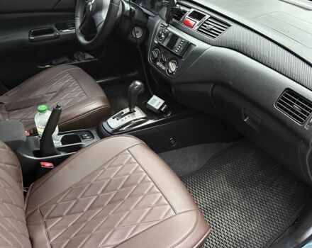 Серый Мицубиси Лансер, объемом двигателя 1.6 л и пробегом 238 тыс. км за 4300 $, фото 3 на Automoto.ua