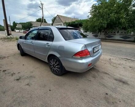 Сірий Міцубісі Lancer, об'ємом двигуна 1.58 л та пробігом 416 тис. км за 3100 $, фото 12 на Automoto.ua