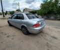 Сірий Міцубісі Lancer, об'ємом двигуна 1.58 л та пробігом 416 тис. км за 3100 $, фото 12 на Automoto.ua