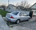 Сірий Міцубісі Lancer, об'ємом двигуна 0.16 л та пробігом 217 тис. км за 4200 $, фото 5 на Automoto.ua