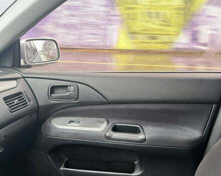 Серый Мицубиси Лансер, объемом двигателя 1.6 л и пробегом 254 тыс. км за 4500 $, фото 46 на Automoto.ua