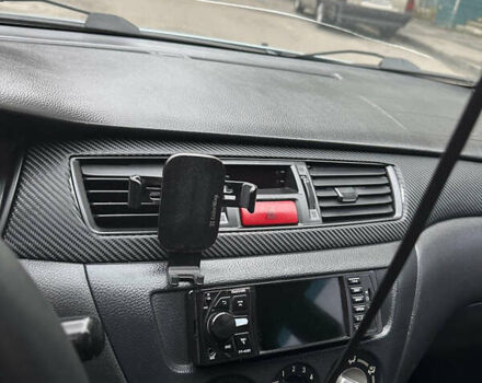 Серый Мицубиси Лансер, объемом двигателя 1.6 л и пробегом 238 тыс. км за 4400 $, фото 11 на Automoto.ua