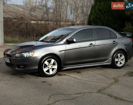 Сірий Міцубісі Lancer, об'ємом двигуна 2 л та пробігом 220 тис. км за 6800 $, фото 4 на Automoto.ua