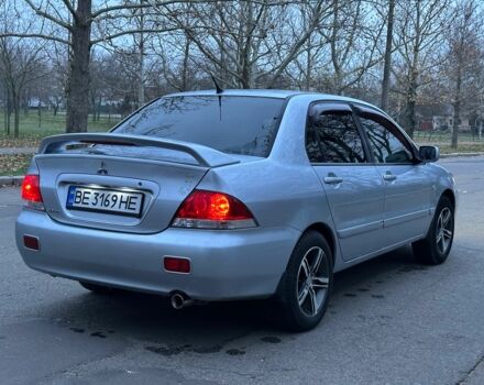 Сірий Міцубісі Lancer, об'ємом двигуна 1.6 л та пробігом 210 тис. км за 4750 $, фото 3 на Automoto.ua