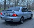 Сірий Міцубісі Lancer, об'ємом двигуна 1.6 л та пробігом 210 тис. км за 4750 $, фото 3 на Automoto.ua