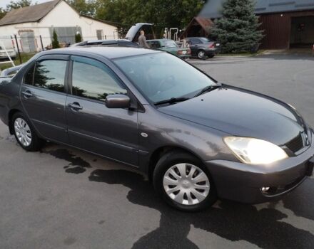 Сірий Міцубісі Lancer, об'ємом двигуна 1.6 л та пробігом 178 тис. км за 5464 $, фото 1 на Automoto.ua