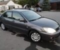 Сірий Міцубісі Lancer, об'ємом двигуна 1.6 л та пробігом 178 тис. км за 5464 $, фото 1 на Automoto.ua