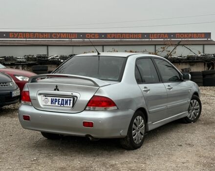 Серый Мицубиси Лансер, объемом двигателя 1.6 л и пробегом 280 тыс. км за 4600 $, фото 1 на Automoto.ua
