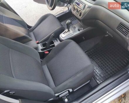 Сірий Міцубісі Lancer, об'ємом двигуна 1.58 л та пробігом 122 тис. км за 6300 $, фото 33 на Automoto.ua