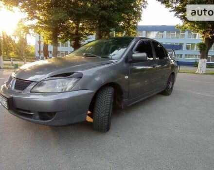 Сірий Міцубісі Lancer, об'ємом двигуна 1.6 л та пробігом 230 тис. км за 3950 $, фото 14 на Automoto.ua