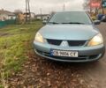 Сірий Міцубісі Lancer, об'ємом двигуна 1.6 л та пробігом 218 тис. км за 5000 $, фото 1 на Automoto.ua
