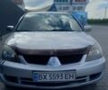 Серый Мицубиси Лансер, объемом двигателя 1.6 л и пробегом 298 тыс. км за 4100 $, фото 31 на Automoto.ua