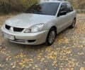 Сірий Міцубісі Lancer, об'ємом двигуна 1.6 л та пробігом 180 тис. км за 2500 $, фото 1 на Automoto.ua