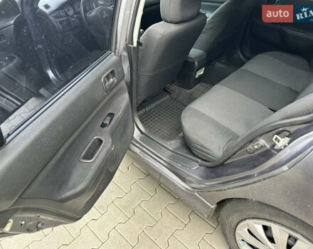 Сірий Міцубісі Lancer, об'ємом двигуна 1.6 л та пробігом 115 тис. км за 2800 $, фото 11 на Automoto.ua