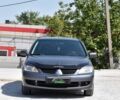 Серый Мицубиси Лансер, объемом двигателя 1.6 л и пробегом 335 тыс. км за 4500 $, фото 1 на Automoto.ua