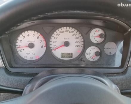 Сірий Міцубісі Lancer, об'ємом двигуна 1.6 л та пробігом 222 тис. км за 3990 $, фото 17 на Automoto.ua