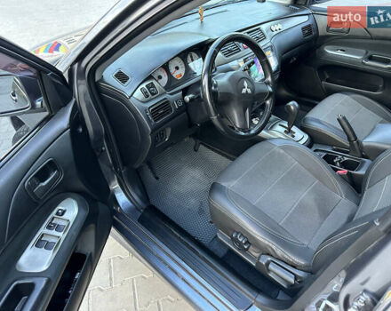 Сірий Міцубісі Lancer, об'ємом двигуна 1.6 л та пробігом 189 тис. км за 6200 $, фото 14 на Automoto.ua