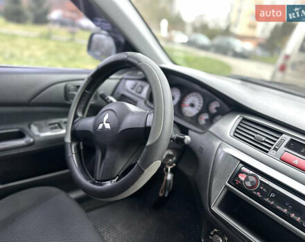 Сірий Міцубісі Lancer, об'ємом двигуна 1.6 л та пробігом 177 тис. км за 2800 $, фото 33 на Automoto.ua