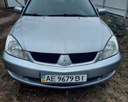 Серый Мицубиси Лансер, объемом двигателя 1.6 л и пробегом 220 тыс. км за 4000 $, фото 3 на Automoto.ua