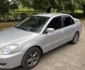 Сірий Міцубісі Lancer, об'ємом двигуна 1.6 л та пробігом 294 тис. км за 3350 $, фото 1 на Automoto.ua