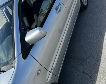 Серый Мицубиси Лансер, объемом двигателя 1.58 л и пробегом 261 тыс. км за 4500 $, фото 4 на Automoto.ua