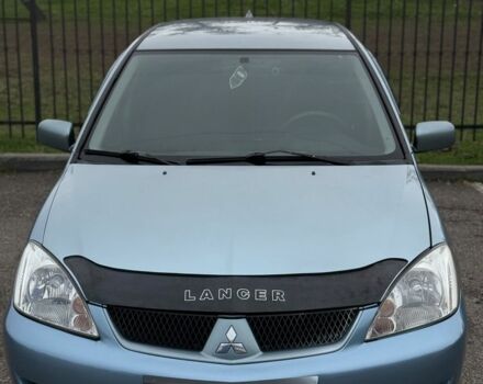 Серый Мицубиси Лансер, объемом двигателя 1.6 л и пробегом 238 тыс. км за 4300 $, фото 22 на Automoto.ua