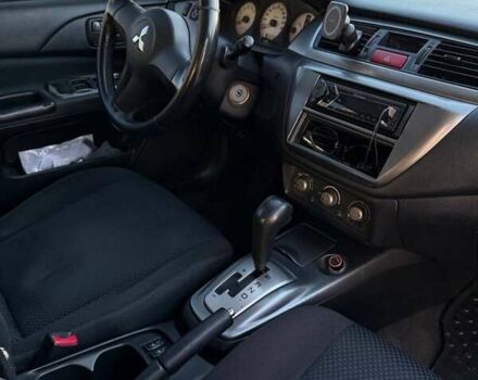 Сірий Міцубісі Lancer, об'ємом двигуна 1.6 л та пробігом 174 тис. км за 4800 $, фото 5 на Automoto.ua