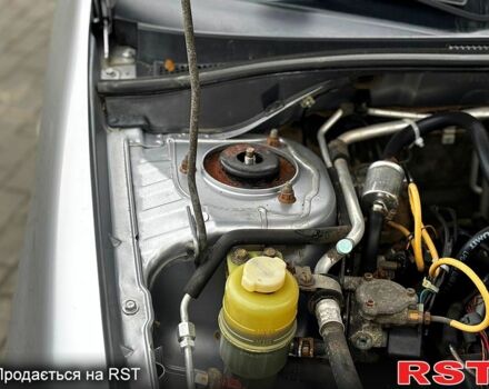 Сірий Міцубісі Lancer, об'ємом двигуна 1.6 л та пробігом 193 тис. км за 3999 $, фото 8 на Automoto.ua