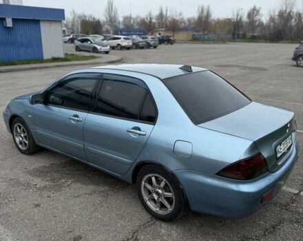 Серый Мицубиси Лансер, объемом двигателя 1.6 л и пробегом 238 тыс. км за 4300 $, фото 23 на Automoto.ua