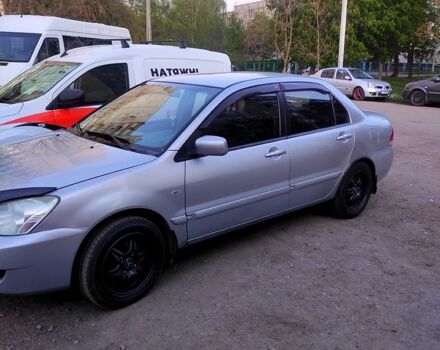 Серый Мицубиси Лансер, объемом двигателя 1.6 л и пробегом 302 тыс. км за 3200 $, фото 3 на Automoto.ua