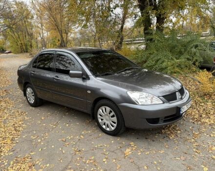 Сірий Міцубісі Lancer, об'ємом двигуна 1.6 л та пробігом 247 тис. км за 4900 $, фото 1 на Automoto.ua