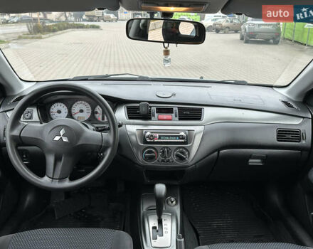 Сірий Міцубісі Lancer, об'ємом двигуна 1.6 л та пробігом 116 тис. км за 5199 $, фото 26 на Automoto.ua