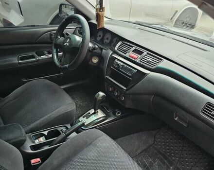 Серый Мицубиси Лансер, объемом двигателя 1.58 л и пробегом 260 тыс. км за 3700 $, фото 4 на Automoto.ua