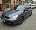 Серый Мицубиси Лансер, объемом двигателя 1.58 л и пробегом 260 тыс. км за 3700 $, фото 3 на Automoto.ua