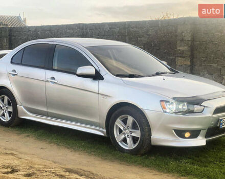 Серый Мицубиси Лансер, объемом двигателя 2 л и пробегом 226 тыс. км за 6200 $, фото 6 на Automoto.ua