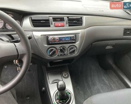 Сірий Міцубісі Lancer, об'ємом двигуна 1.59 л та пробігом 44 тис. км за 6200 $, фото 21 на Automoto.ua