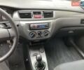 Сірий Міцубісі Lancer, об'ємом двигуна 1.59 л та пробігом 44 тис. км за 6200 $, фото 21 на Automoto.ua