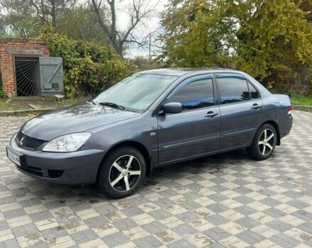 Міцубісі Lancer 2007 у Белой Церкве на Automoto.ua Сірий Міцубісі Lancer, об'ємом двигуна 1.6 л та пробігом 254 тис. км за 3200 $, фото 1 на Automoto.ua